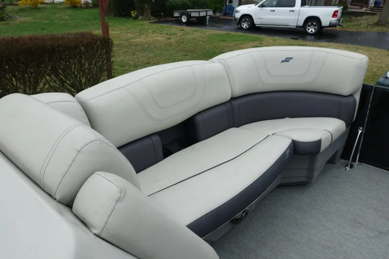 Slide: The Image of 2021 Starcraft SLS 5 DC boat interior with plush seating and modern design. - 13