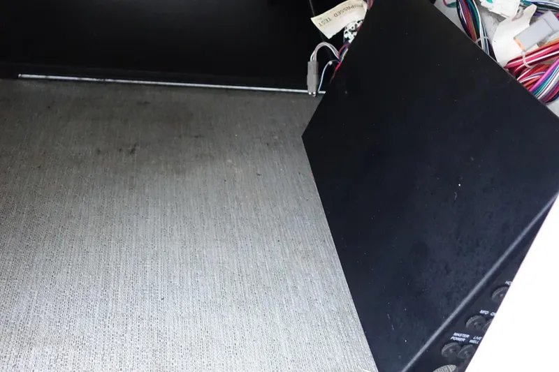 Slide: The Image of Interior view of a 2021 Starcraft SLS 5 DC, showing wiring and panel. - 21