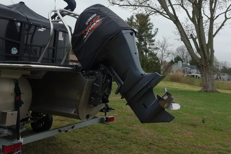 Slide: The Image of 2021 Starcraft SLS 5 DC boat with Yamaha outboard motor on a trailer. - 6