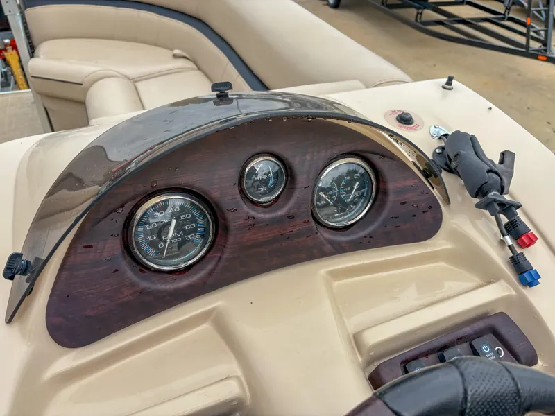 Slide: The Image of Dashboard of 2018 Trifecta 22 C CS 2.75 boat with gauges and controls. - 12