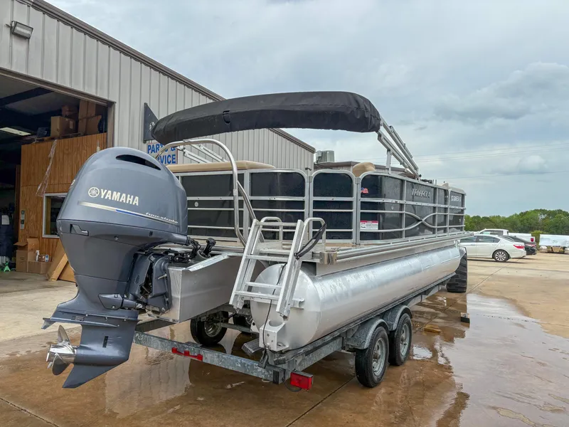 Slide: The Image of 2018 Trifecta 22 C CS 2.75 pontoon boat with Yamaha outboard motor on trailer. - 6