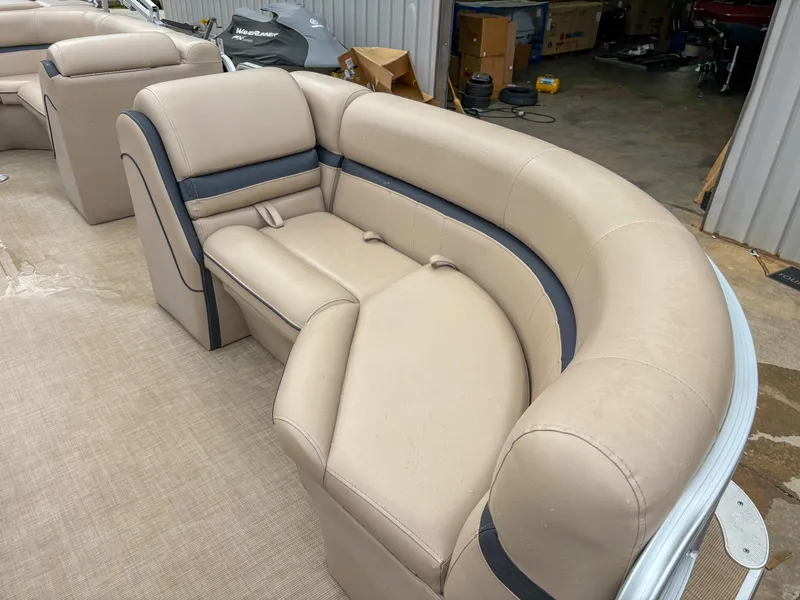 Slide: The Image of 2018 Trifecta 22 C CS 2.75 pontoon boat interior with beige seating. - 8