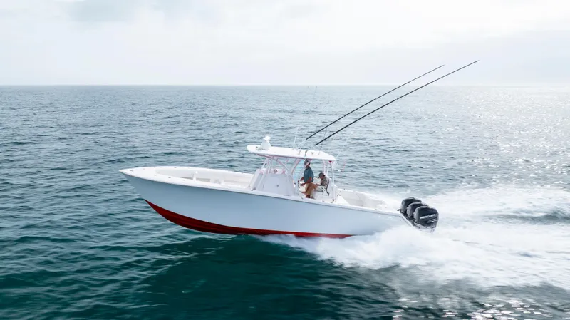 Slide: The Image of 2024 SeaHunter 35 Tournament boat cruising on open water, showcasing speed and performance. - 0