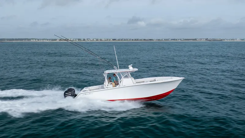 Slide: The Image of 2024 SeaHunter 35 Tournament boat cruising on open water, showcasing speed and performance. - 2