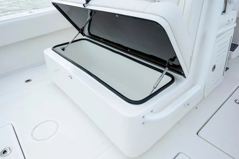 Slide: The Image of Open storage compartment on 2024 SeaHunter 35 Tournament boat, showcasing spacious interior. - 20