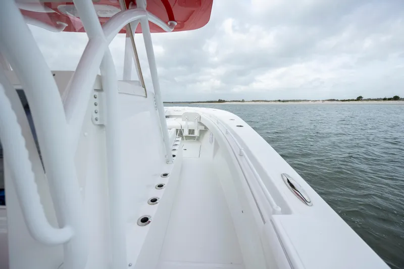 Slide: The Image of 2024 SeaHunter 35 Tournament boat on water, showcasing sleek deck design and ocean view. - 29