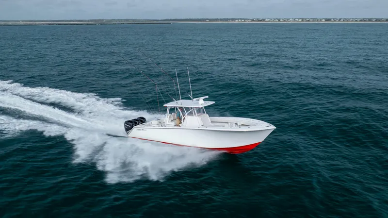 Slide: The Image of 2024 SeaHunter 35 Tournament boat cruising on open water, showcasing speed and performance. - 3