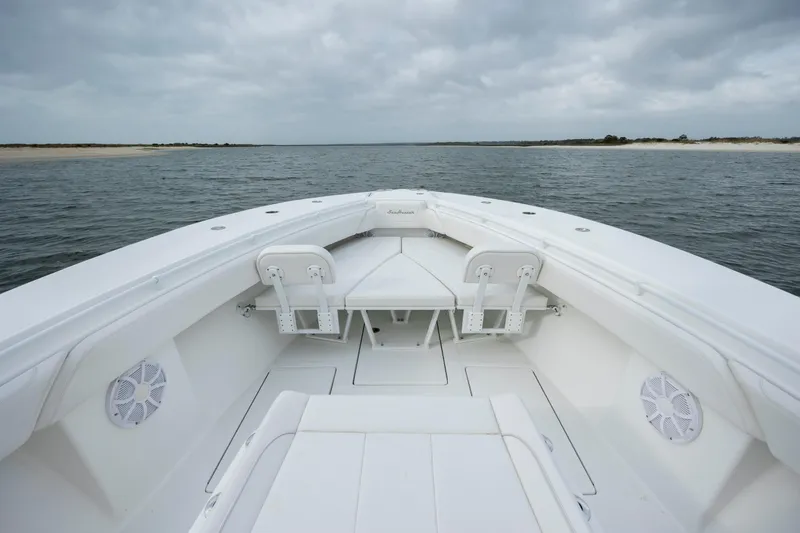 Slide: The Image of 2024 SeaHunter 35 Tournament boat on open water, showcasing spacious deck and seating. - 31