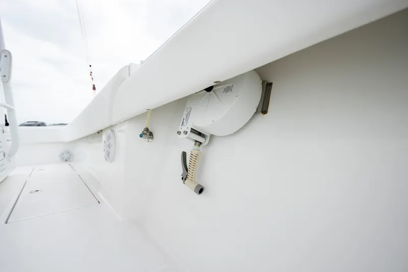 Slide: The Image of 2024 SeaHunter 35 Tournament boat interior detail, featuring fishing equipment storage. - 43