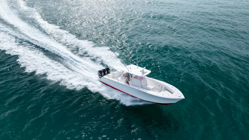 Slide: The Image of 2024 SeaHunter 35 Tournament boat cruising on open water. - 9
