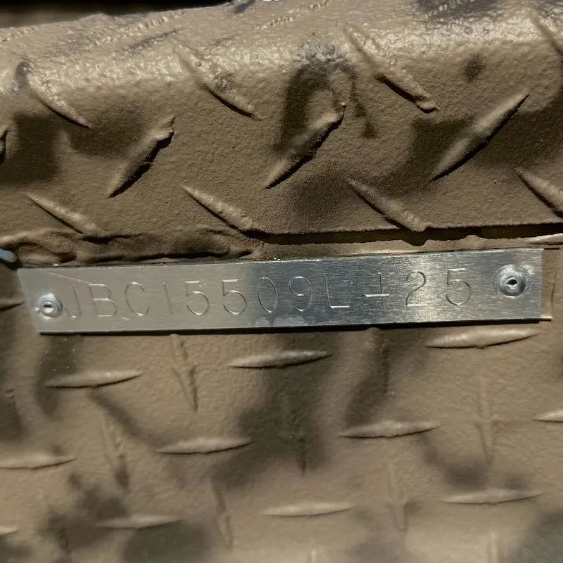 Slide: The Image of Metal plate with embossed code on textured surface, Xpress H16DB Nat Gear Paint, 2025 model. - 7