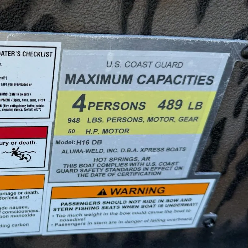 Slide: The Image of 2025 Xpress H16DB boat capacity label, 4 persons, 489 lbs, 50 HP motor. - 7