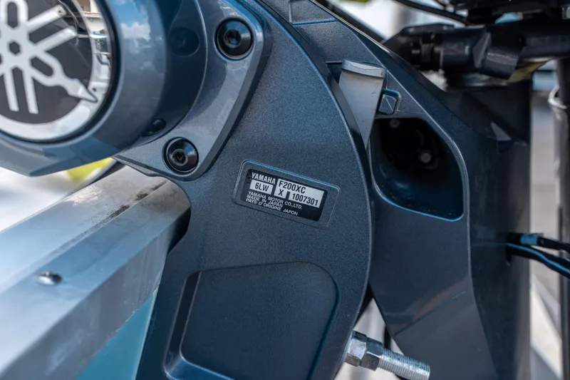 Slide: The Image of Close-up of Yamaha F200XC engine on 2025 Sea Hunt Ultra 234 boat. - 29