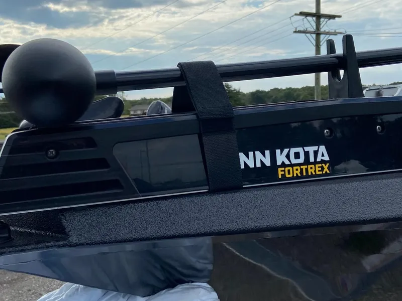 Slide: The Image of Minn Kota Fortrex motor on 2024 Xpress X19 Pro boat, outdoors. - 11