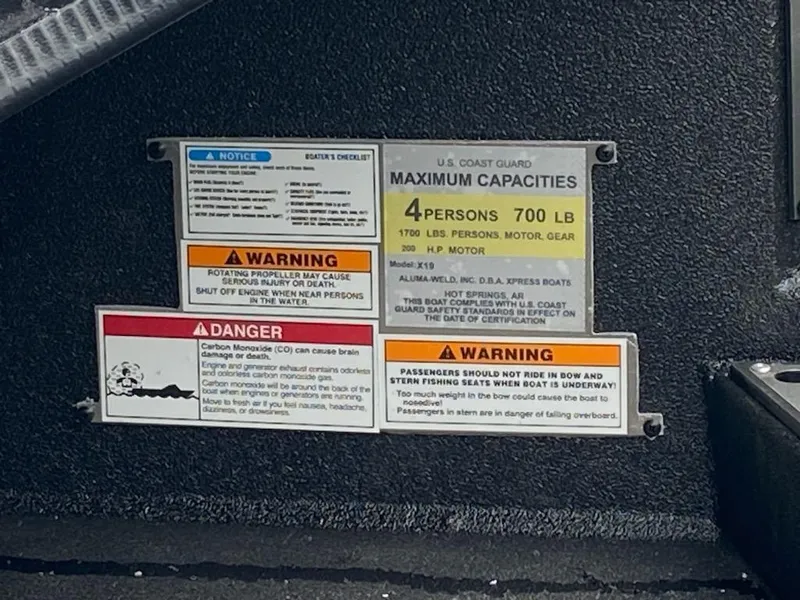Slide: The Image of 2024 Xpress X19 Pro capacity and safety warning labels, detailing maximum load and safety precautions. - 5