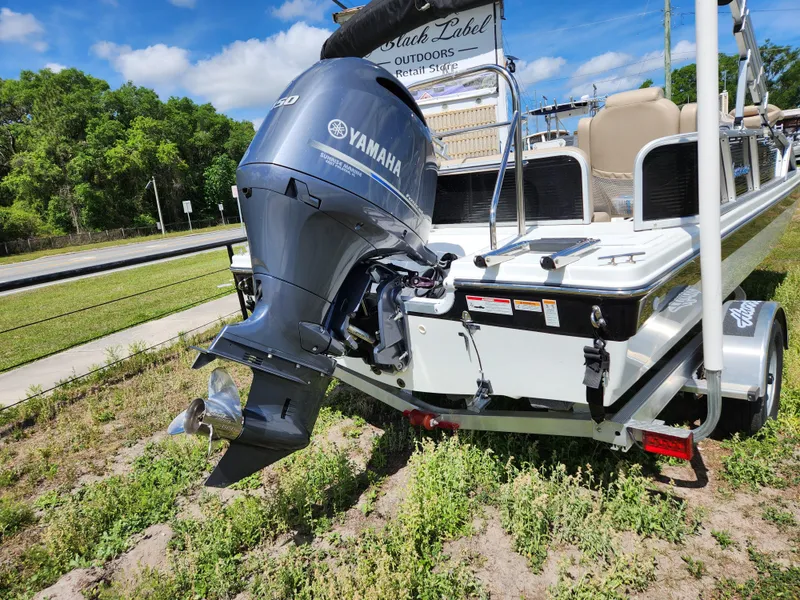 Slide: The Image of 2023 Hurricane Fundeck 198 Fish Package with Yamaha outboard motor on trailer. - 9