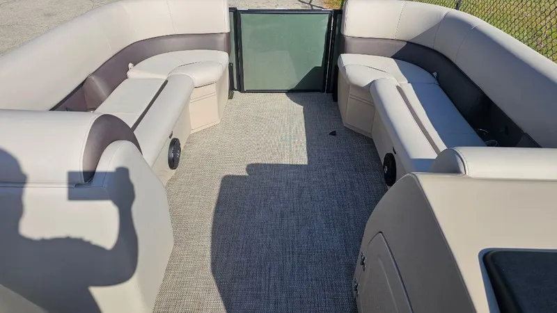 Slide: The Image of 2025 Bentley Pontoons Legacy 243 Swingback interior with spacious seating and modern design. - 5