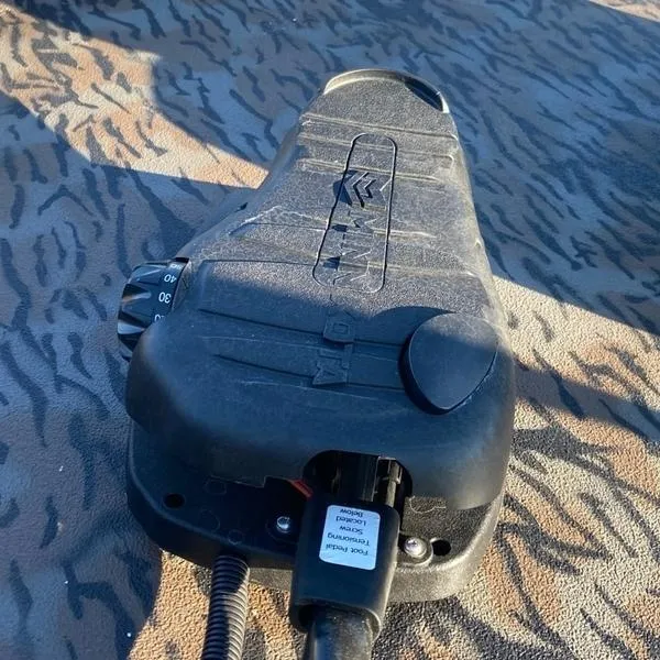 Slide: The Image of 2024 Xpress XP200 boat part on patterned surface, showcasing control panel and wiring. - 12