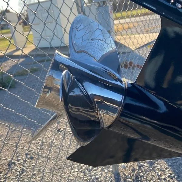 Slide: The Image of Close-up of a shiny propeller on a 2024 Xpress XP200 boat. - 6