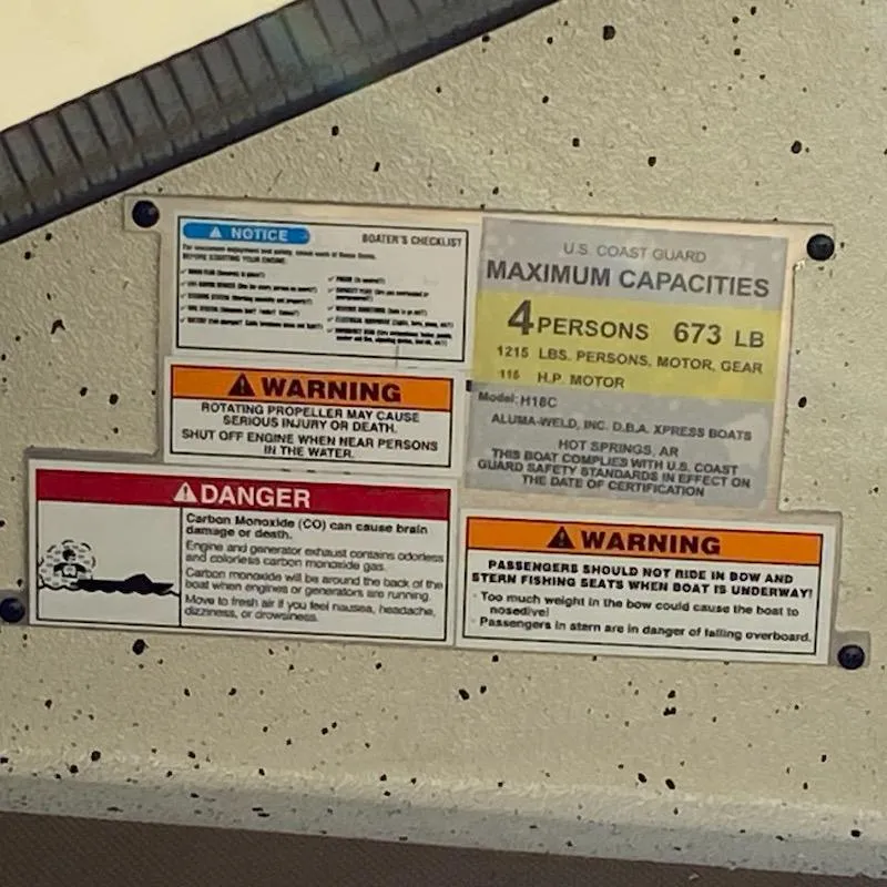 Slide: The Image of Safety warning labels on 2024 Xpress H18C boat, detailing capacity and hazard information. - 8