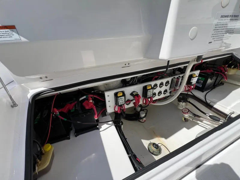 Slide: The Image of Electrical panel of 2022 Everglades 273 CC boat, showcasing wiring and components. - 28