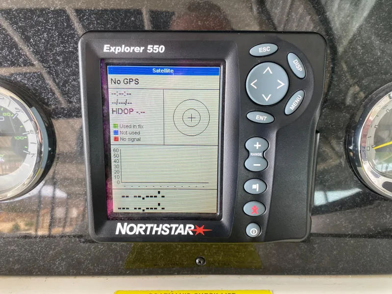 Slide: The Image of Northstar Explorer 550 GPS unit on 2010 Sea Ray 300 SLX boat dashboard. - 28