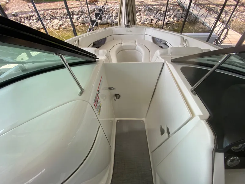 Slide: The Image of 2010 Sea Ray 300 SLX boat interior with seating and open deck view. - 33
