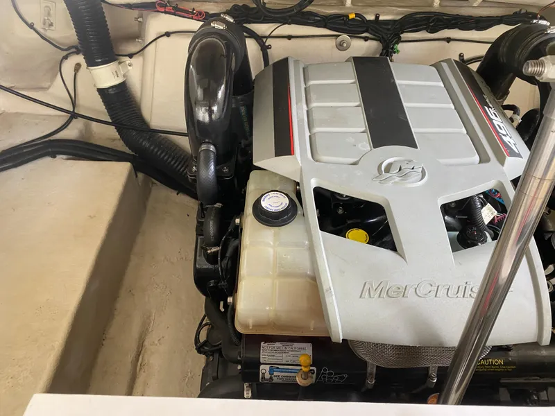 Slide: The Image of Engine compartment of a 2010 Sea Ray 300 SLX boat, featuring a MerCruiser engine. - 45