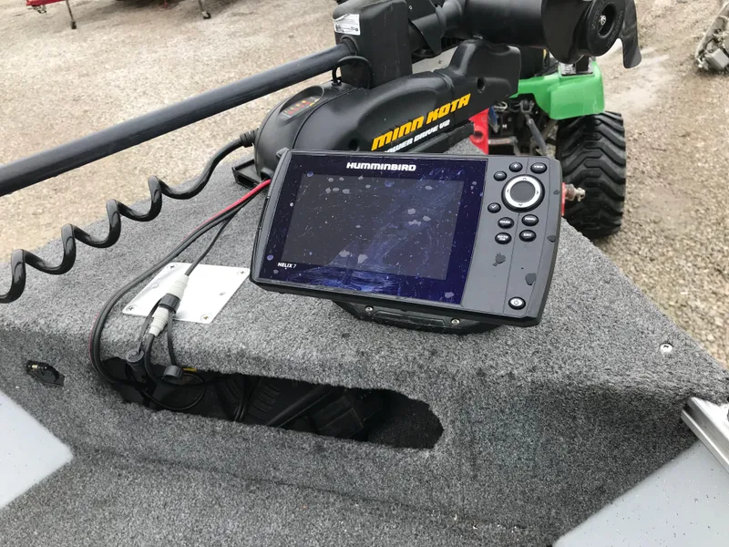 Slide: The Image of Fishfinder and trolling motor on 2016 Lund 1600 Rebel SS boat deck. - 17