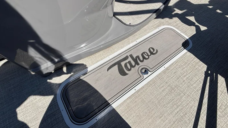 Slide: The Image of 2024 Tahoe Pontoon 2585 Cascade deck with logo, featuring sleek design and durable materials. - 15