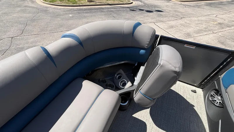 Slide: The Image of 2024 Tahoe Pontoon 2585 Cascade interior with gray seating and cup holders. - 21