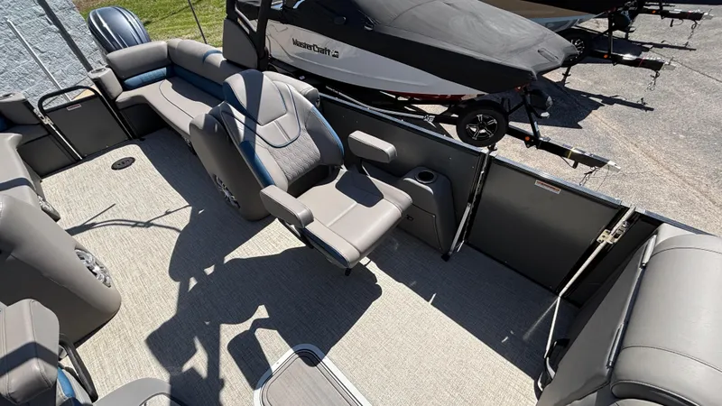 Slide: The Image of 2024 Tahoe Pontoon 2585 Cascade interior with spacious seating and modern design. - 25