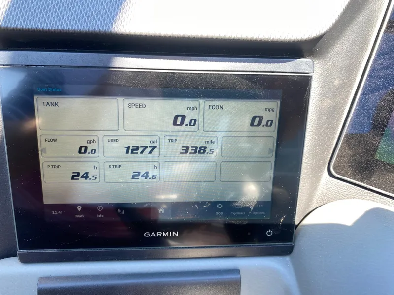 Slide: The Image of Garmin display on 2024 Tahoe 2585 Cascade showing boat status and fuel usage. - 33