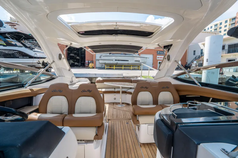 Slide: The Image of Luxurious 2015 Sea Ray 350 SLX boat interior with tan leather seating and sleek design. - 35