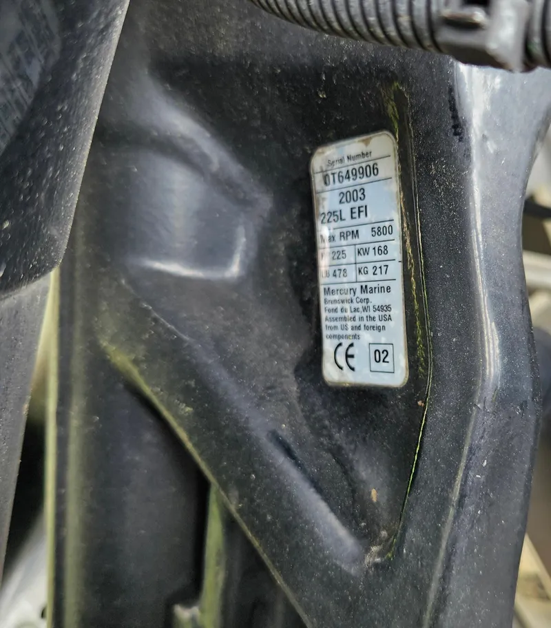 Slide: The Image of Close-up of a Mercury Marine engine label on a 1993 Bullet 20XD boat. - 6