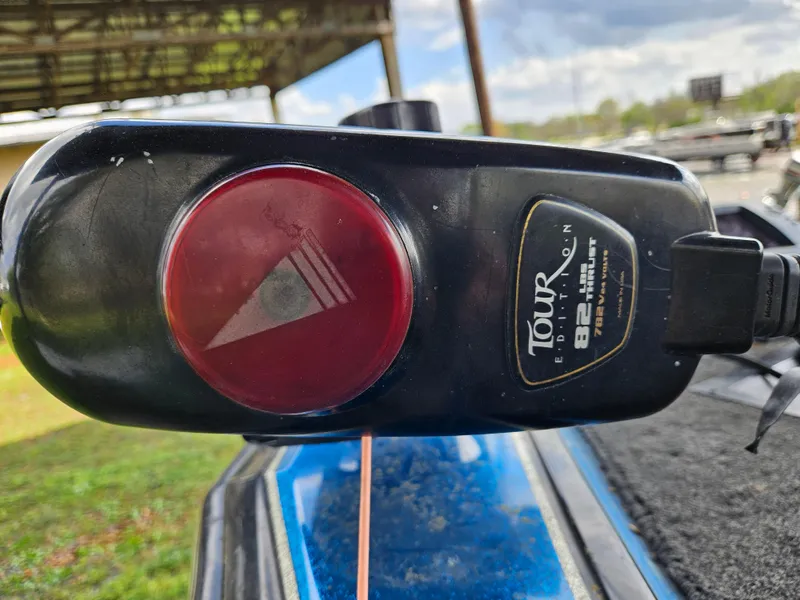 Slide: The Image of Close-up of a 1993 Bullet 20XD boat trolling motor with a red indicator light. - 9