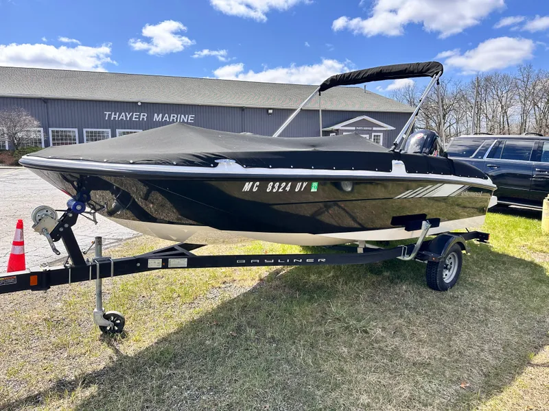 Slide: The Image of 2023 Bayliner Element 18 Deck Boat on trailer at Thayer Marine. - 1