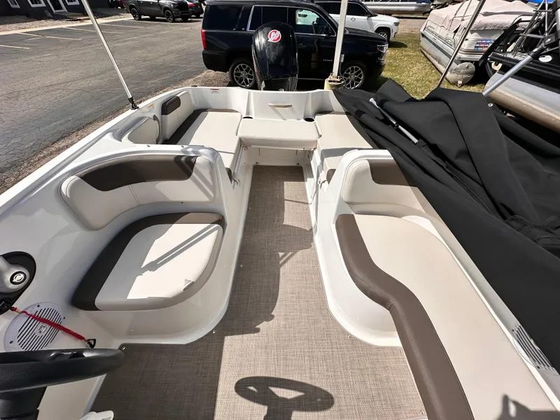 Slide: The Image of 2023 Bayliner Element 18 Deck Boat interior with spacious seating and modern design. - 4