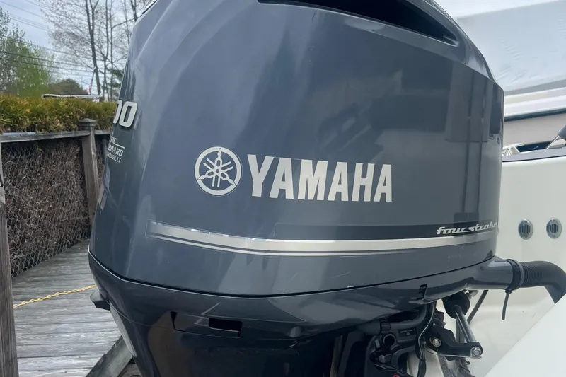 Slide: The Image of Yamaha outboard motor on 2022 Brig Eagle 8 boat, docked outdoors. - 20