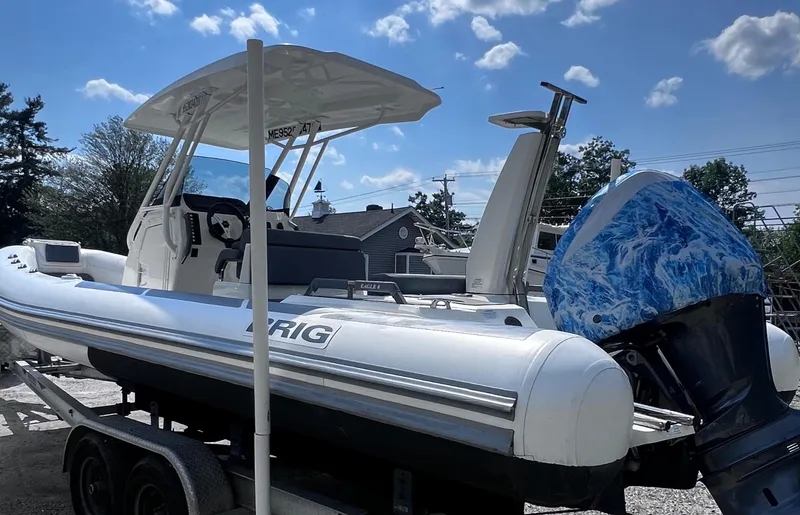 Slide: The Image of 2022 Brig Eagle 8 boat on trailer, featuring a sleek design and powerful outboard motor. - 24