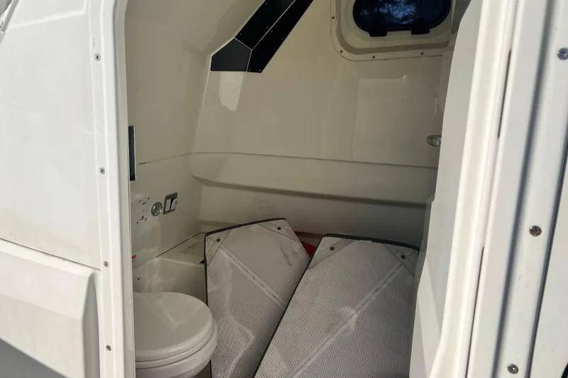 Slide: The Image of Interior cabin of 2022 Brig Eagle 8 boat with toilet and cushions. - 33