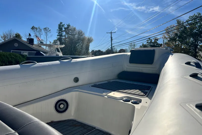 Slide: The Image of 2022 Brig Eagle 8 boat interior under clear blue sky. - 38