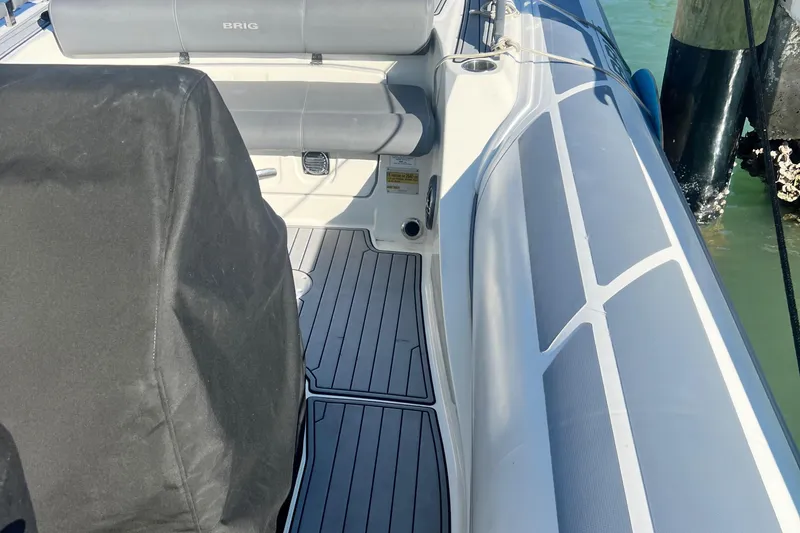 Slide: The Image of 2022 Brig Eagle 8 boat interior with seating and deck details. - 8