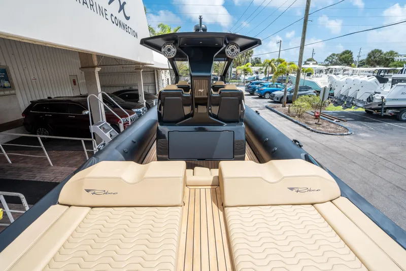Slide: The Image of 2023 Ribco Seafarer 36 X luxury boat with beige seating and sleek design. - 10