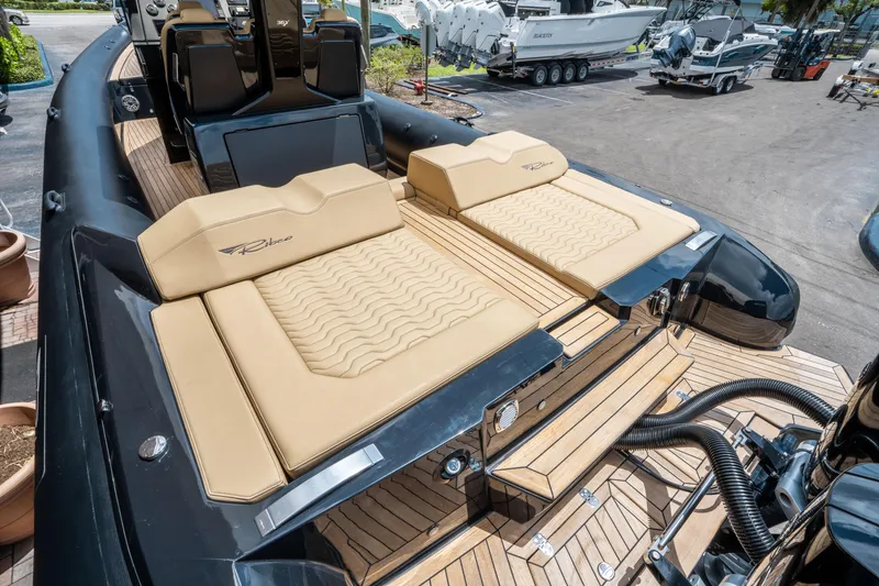 Slide: The Image of 2023 Ribco Seafarer 36 X luxury boat with tan seating and sleek design. - 12