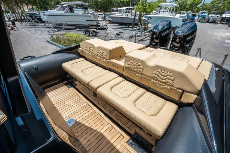 Slide: The Image of 2023 Ribco Seafarer 36 X luxury boat with beige seating and twin engines. - 15
