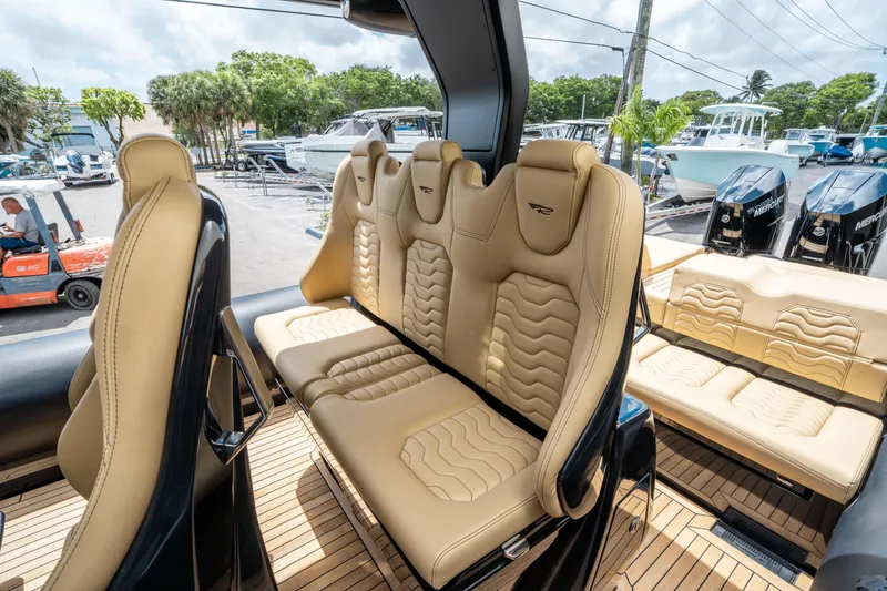 Slide: The Image of Luxurious seating on 2023 Ribco Seafarer 36 X boat with beige upholstery. - 27