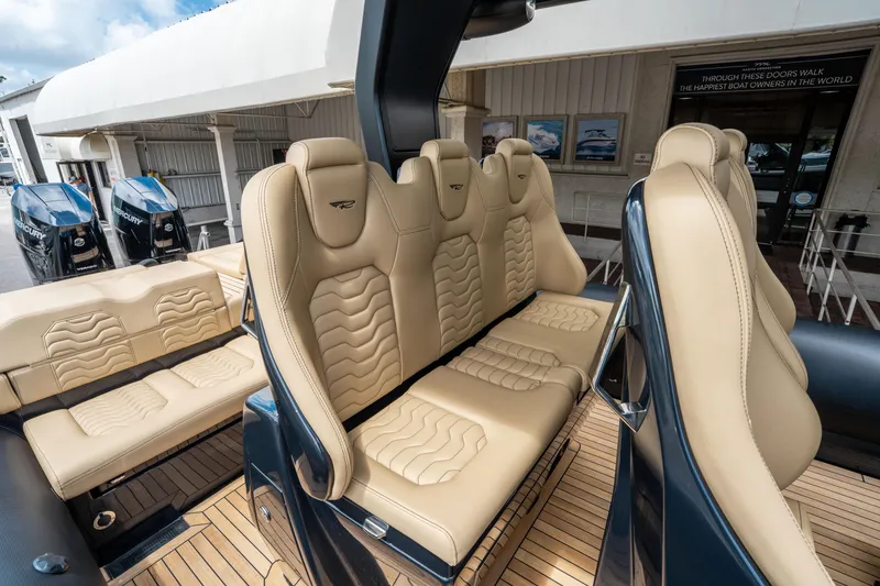 Slide: The Image of Luxurious seating on 2023 Ribco Seafarer 36 X boat with beige upholstery. - 28