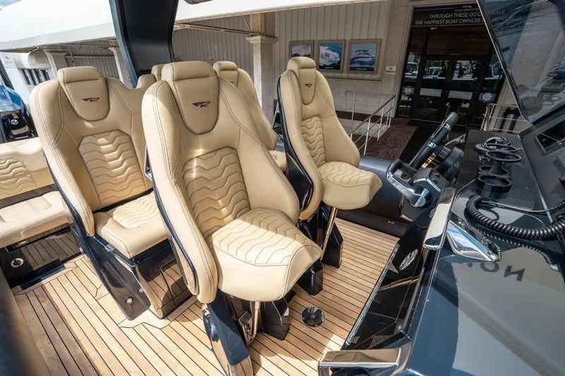 Slide: The Image of Luxurious seating on 2023 Ribco Seafarer 36 X boat with beige leather upholstery. - 33