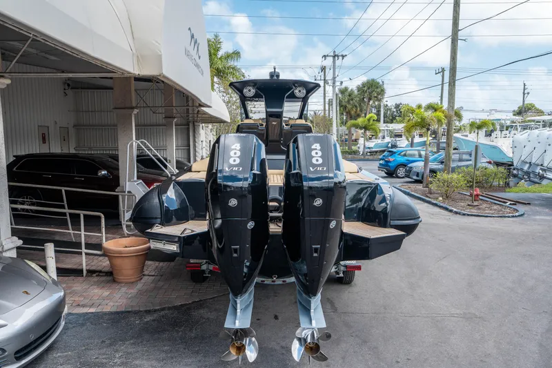 Slide: The Image of 2023 Ribco Seafarer 36 X with dual 400 HP engines, parked outdoors. - 4